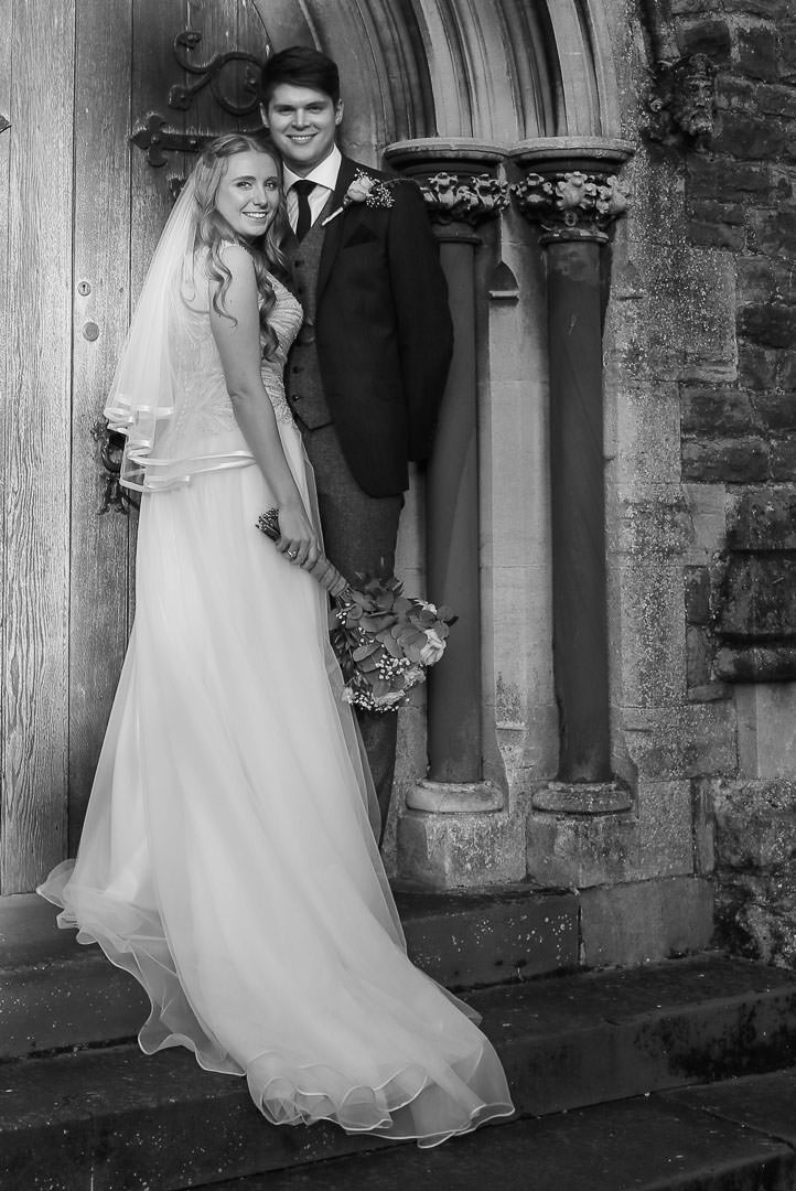 bride and groom outside St Michael's church in Camberley