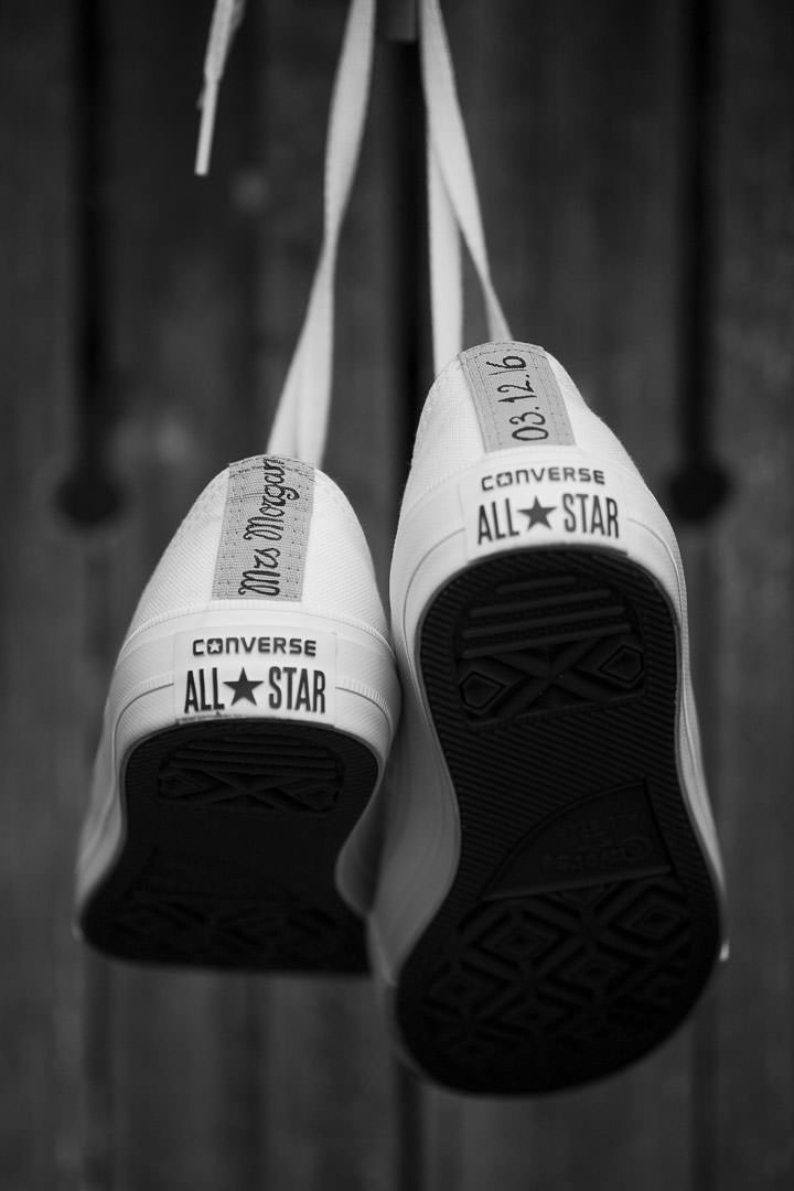 the bride's customised all star converse trainers for her wedding day