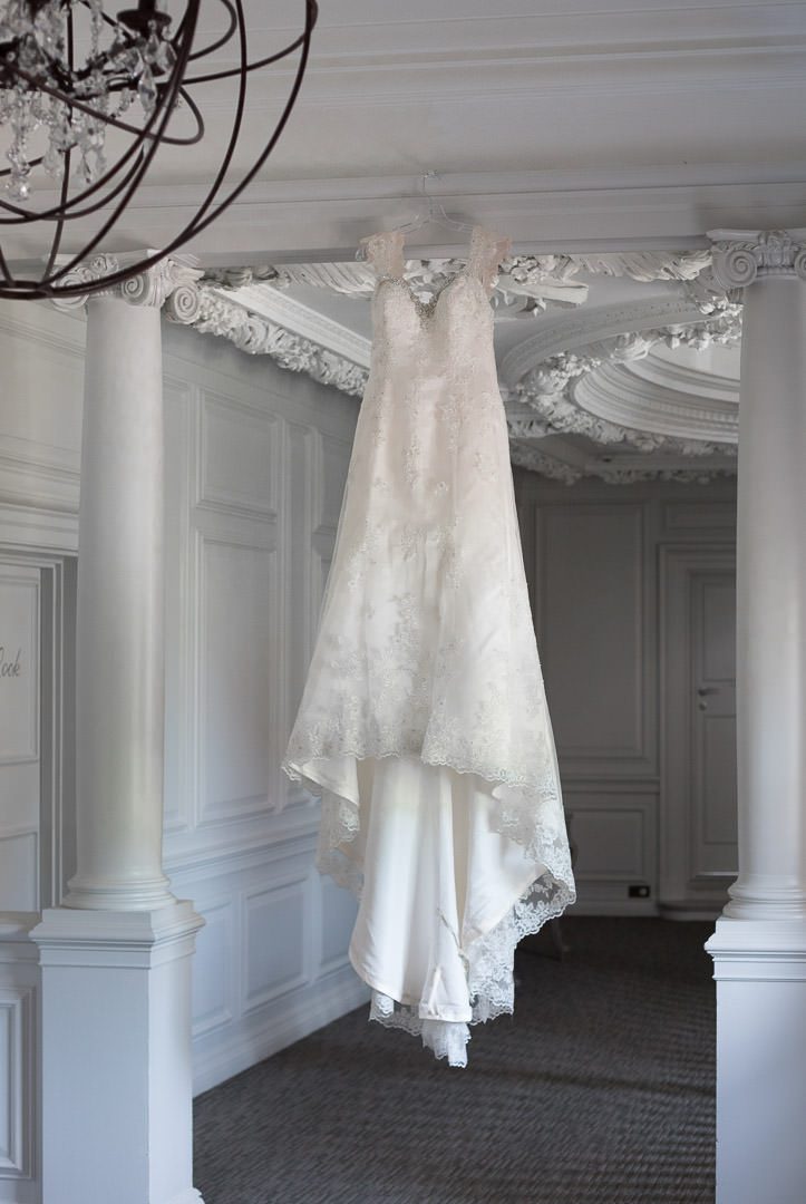 Wedding dress hanging in the upstairs hallway at Barnett Hill Hotel
