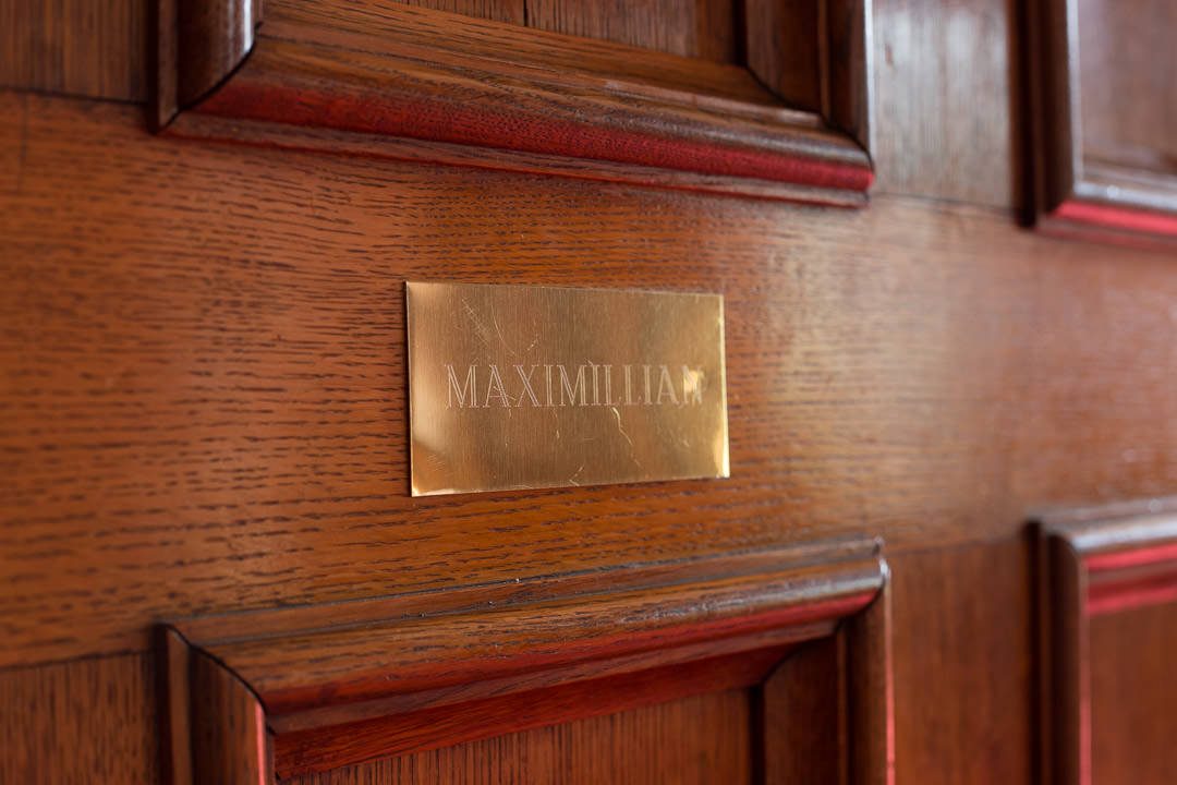 the brass door plate on the maximillian room