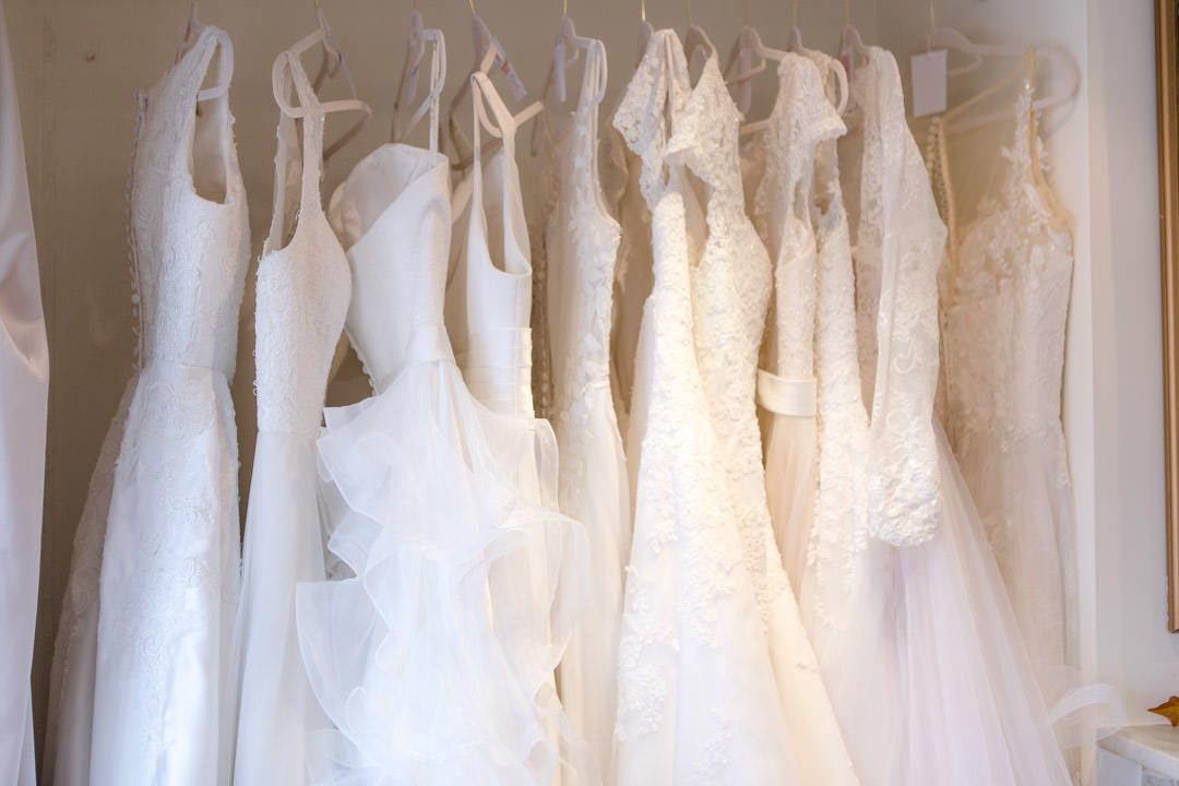 rail of wedding dresses at the Farnham Boutique, bridal shop