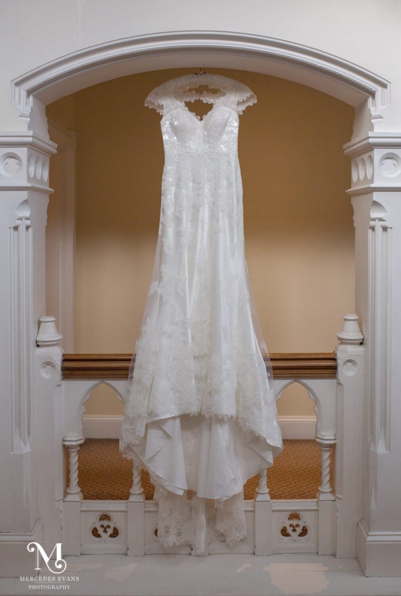 the bride's dress hangs in the gallery at the Elvetham