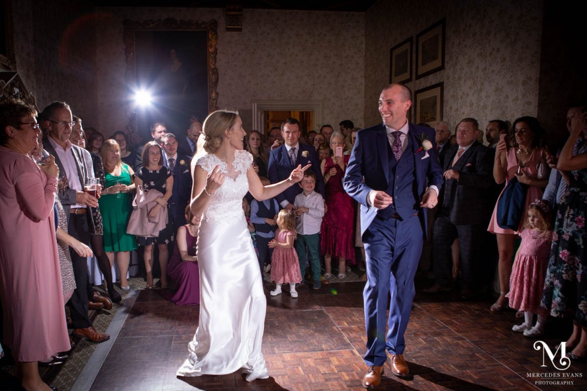The bride and groom perform their choreographed first dance