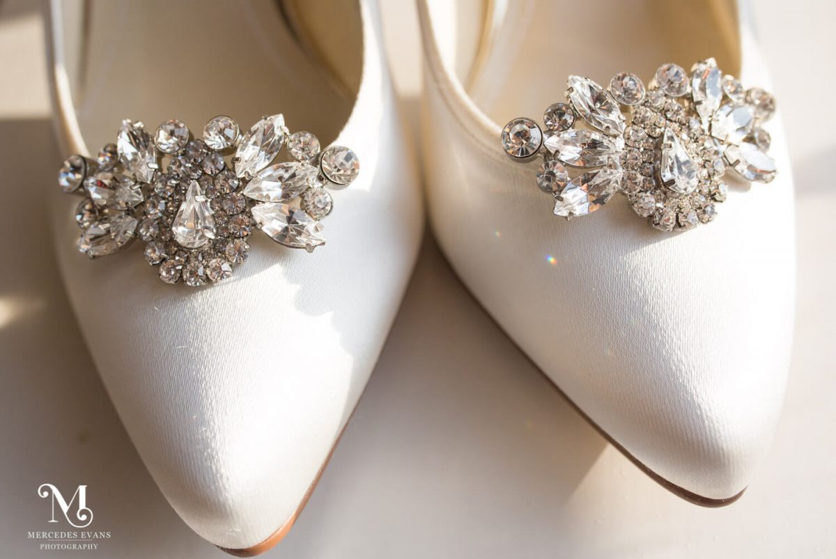The bride's wedding shoes with diamante buckles