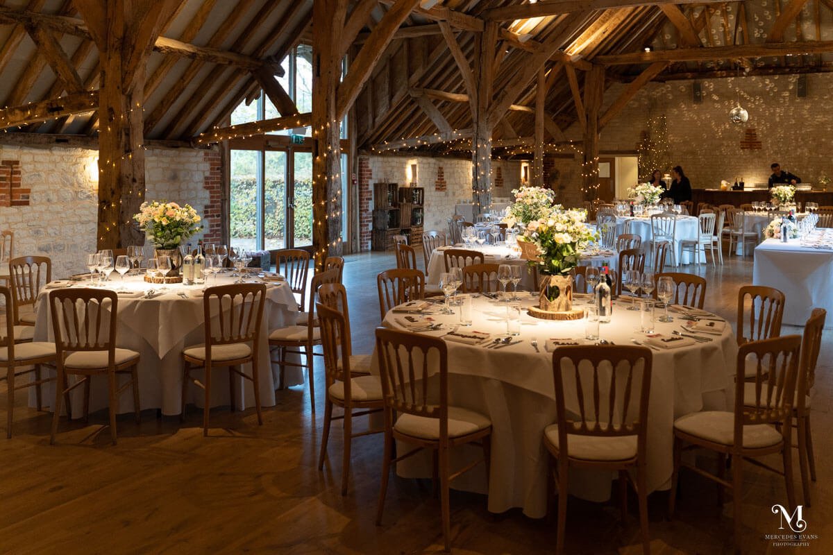 The Barn at Bury Court set up for a wedding breakfast