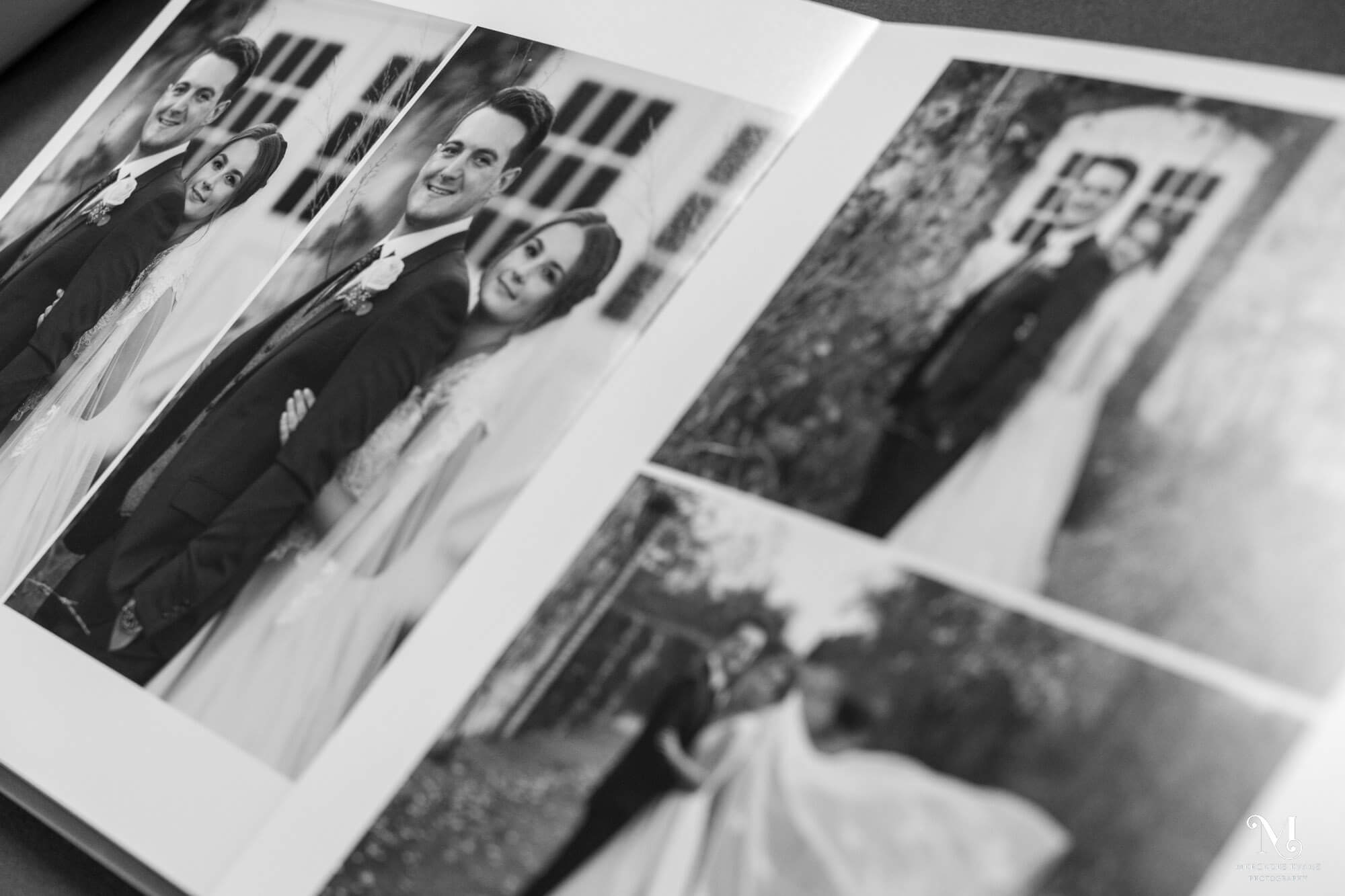 inside of a wedding album shows a bride and groom together in various photographs in black and white