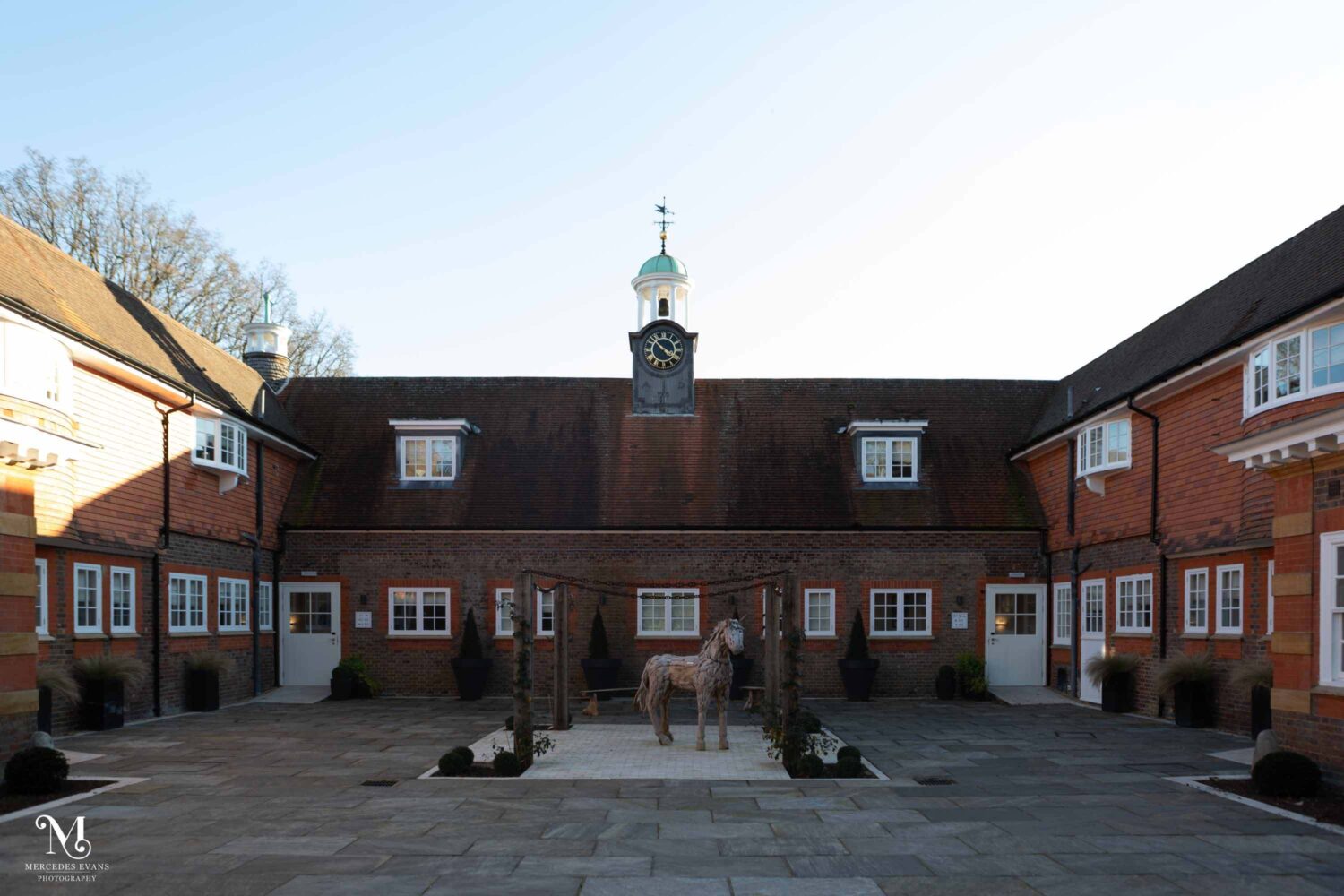 the Courtyard at Barnett Hill Hotel with the wooden horse sculpture
