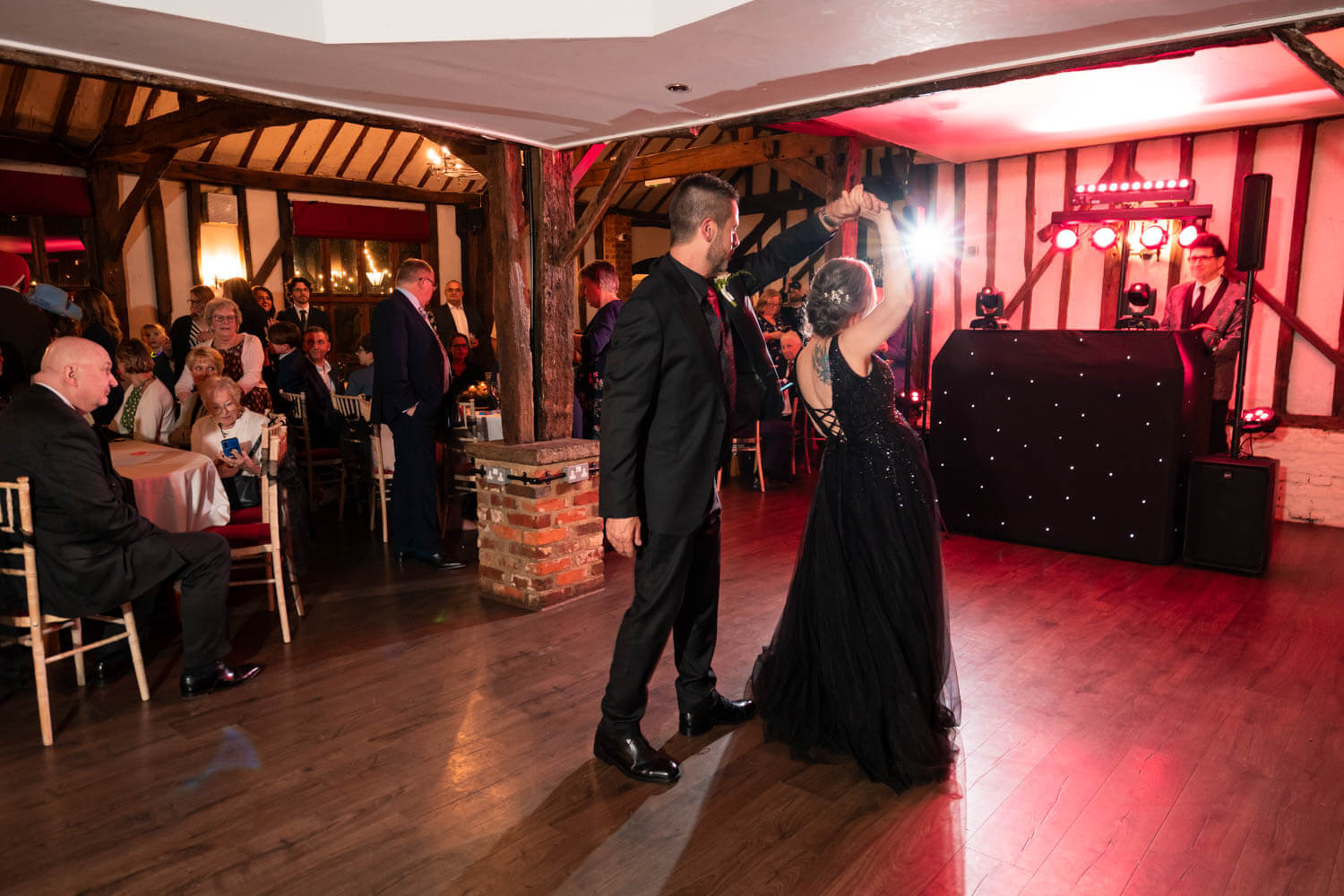 the bride and groom enjoy their first dance in the Briar Barn at Cantley house